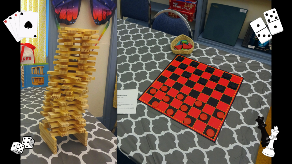 Pictures of a tower built with wooden Structures blocks and a checkerboard with pieces arranged for a game on the new activity tables.
